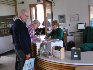 Volunteers helping visitors in the Welcome Building